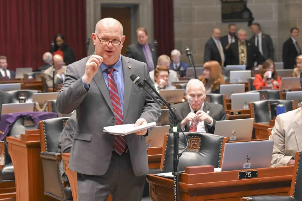 Missouri state Rep. Chris Brown speaking in government chamber.